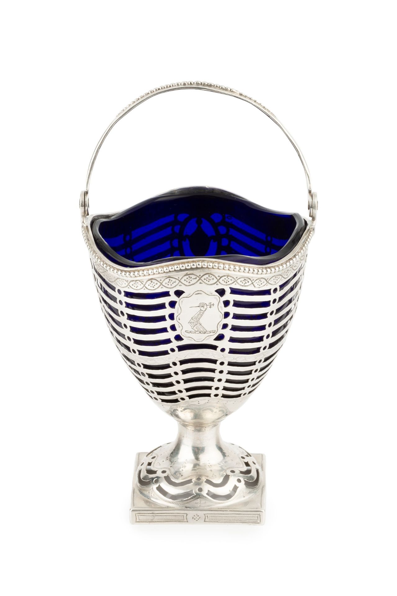 A George III silver swing handled sugar basket, with beaded border, pierce-decorated with