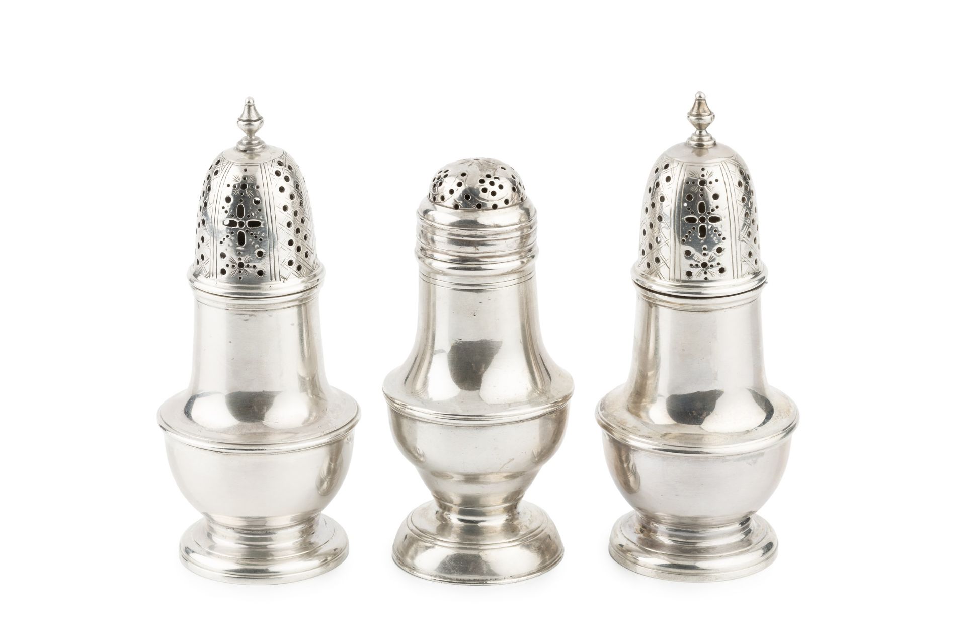 A pair of early George III silver baluster small castors, with girdled bodies and pierced and