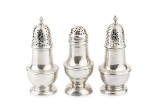 A pair of early George III silver baluster small castors, with girdled bodies and pierced and