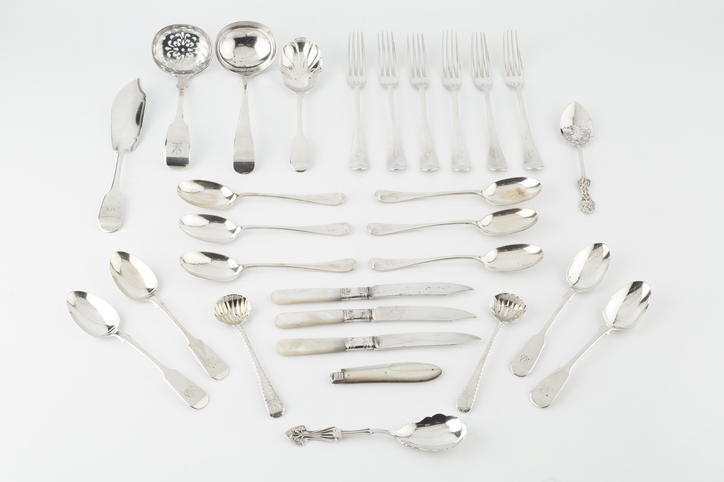 A set of six George V silver Hanoverian pattern dessert forks, and six matching teaspoons by John