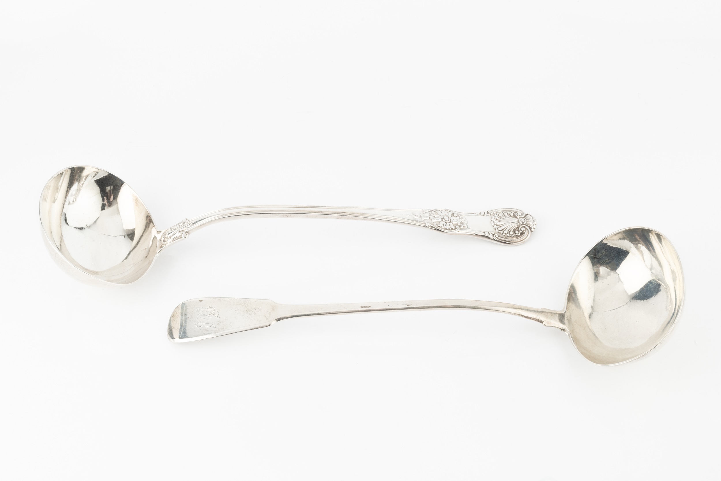 A George IV silver King's pattern soup ladle, by Charles Eley, London 1824, 34cm long, and a