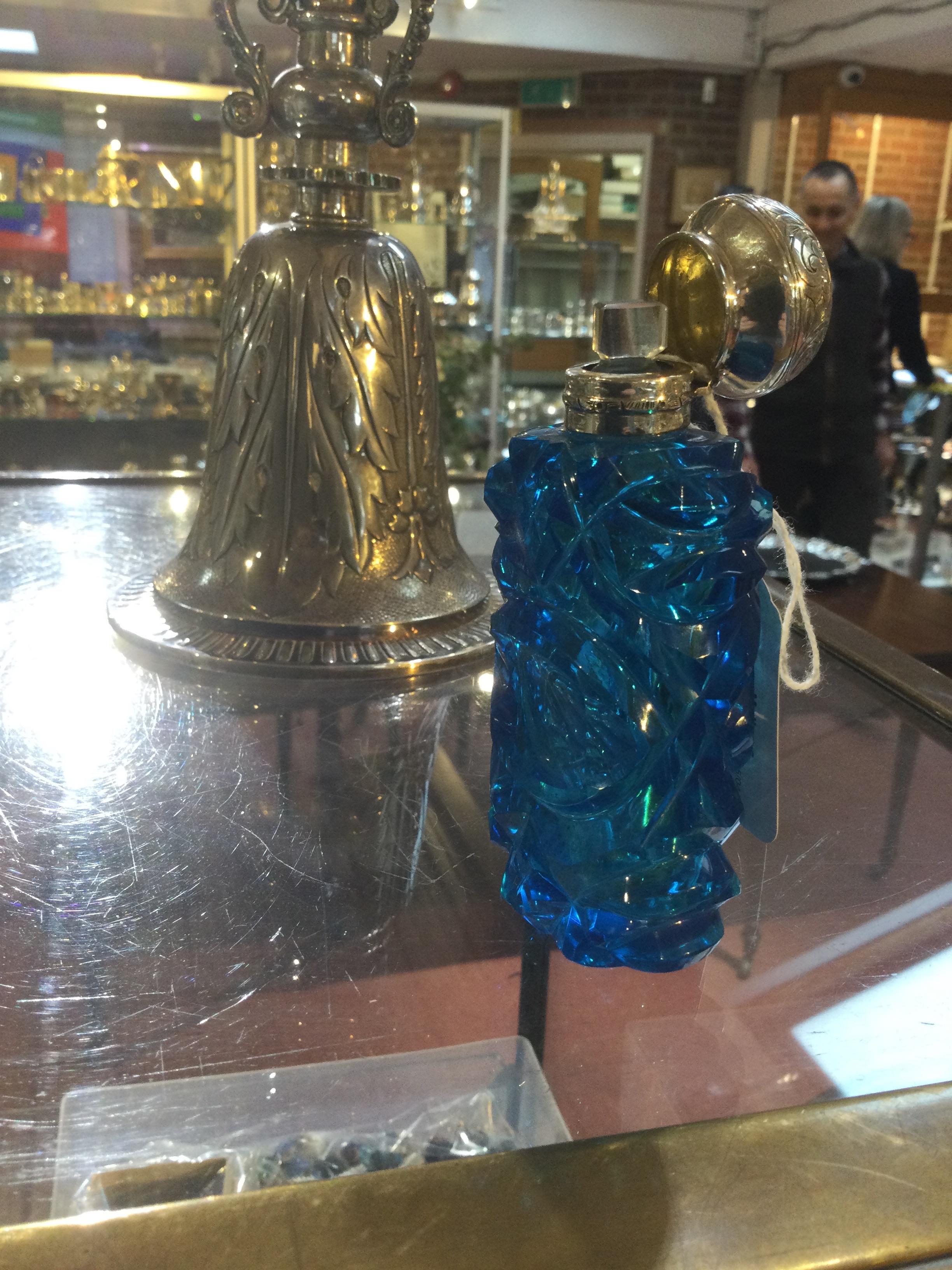 A 19th century French blue glass scent bottle, of moon flask form, having bands of hobnail and slice - Image 4 of 10