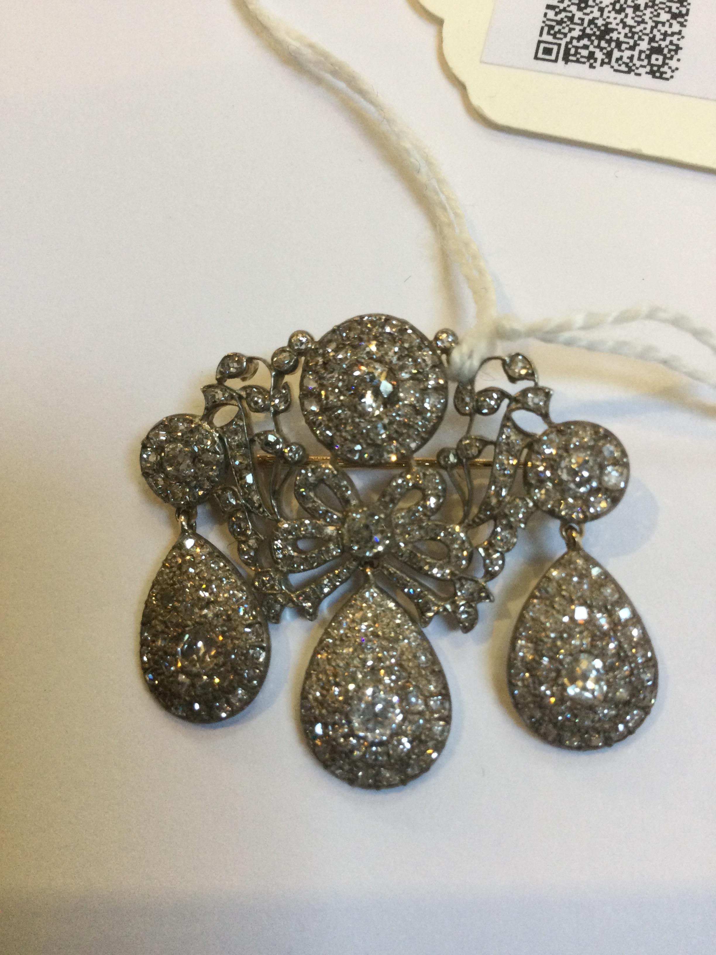 A diamond girandole brooch, formed as a trio of pear-shaped cluster drops suspended from a central - Image 6 of 7