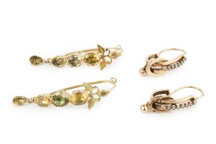 A pair of gold and seed pearl set earrings, of oval hoop design, set with a line of seed pearls