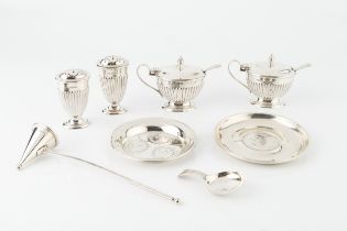 A collection of silver, comprising a George III caddy spoon with bright-cut decoration, maker I.T,