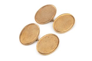 A pair of 9ct gold oval cufflinks, with engine turned decoration. (2) approx 5.1g overall