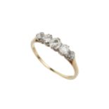 A diamond five stone ring, the graduated old cut stones claw set to an unmarked yellow metal