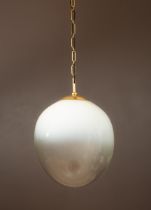 A Roman & Williams Guild, New York hanging egg lamp