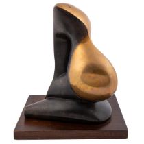 In the manner of Henry Moore, a bronze sculpture