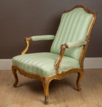 An 18th century Italian gilt and carved framed open armchair