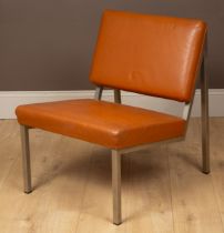 A mid-century cognac leather and chrome lounge chair