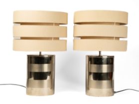 A pair of chrome cylinder table lamps after Goffredo Reggiani