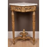 A gilt marble-topped corner console table