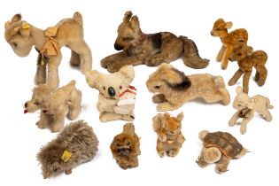 A collection of eleven mid-century Steiff animals and one other