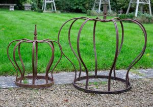 Two wrought iron 'crown' plant supports