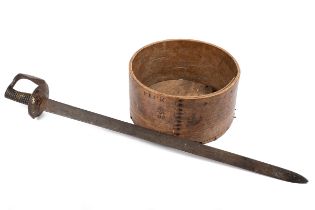 A rustic bentwood peck measure and a sword