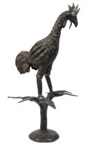 A bronze sculpture of a cockerel