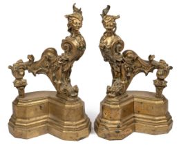 A pair of French cast brass chenets