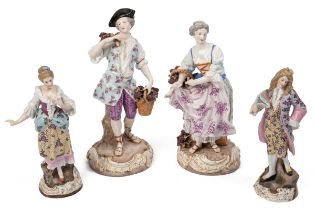 A pair of 19th century Meissen figures together with a pair of German pottery figures