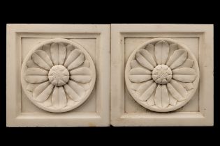 A pair of marble plaques