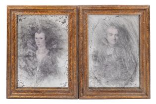 A pair of decorative mirrored portraits