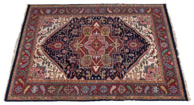A 20th century hand-woven Heriz style rug