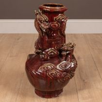 An oriental sang de boeuf glazed vase