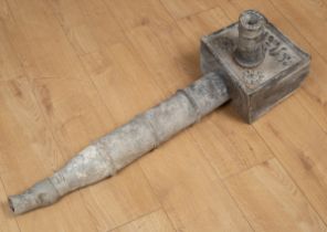 An antique lead pump hopper