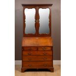 A George III mahogany bureau bookcase