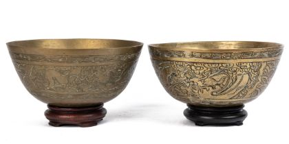 A pair of antique Chinese brass temple bowls