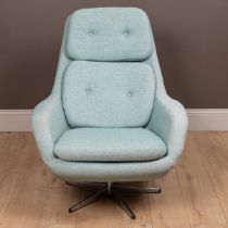 A 1970s Scandinavian teal-upholstered button-back easy chair