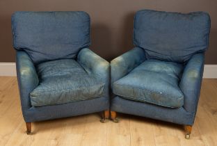 A pair of Howard style deep armchairs