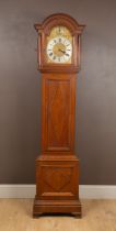 A continental oak longcase clock