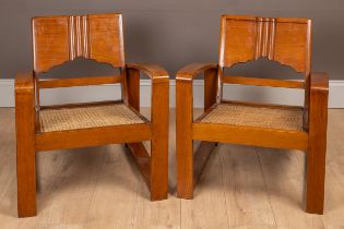 A pair of Art Deco style armchairs