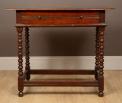 A 17th century and later fruitwood side table