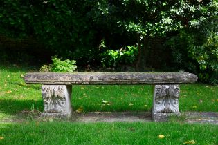 A large rectangular garden bench