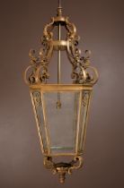 A brass and glass-panelled octagonal hall lantern