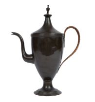 A George III copper coffee pot in the Adam style