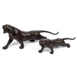 Two Japanese Meiji style bronze tiger statues