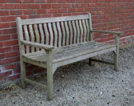A teak slatted bench by Bramblecrest