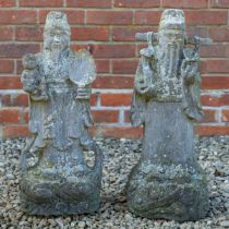 A pair of Chinese carved stone figures of immortals