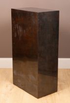 A patinated brass-clad statue plinth