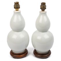 A pair of white porcelain table lamps
