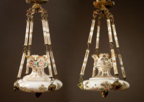 A pair of opalescent glass chandeliers