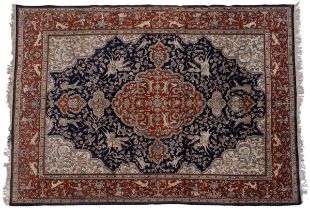 An early 20th century hand-woven Kashan rug