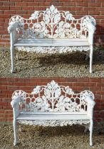 A pair of cast iron benches