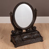 A Victorian oak carved dressing table mirror