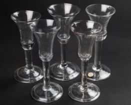 Five antique wine glasses