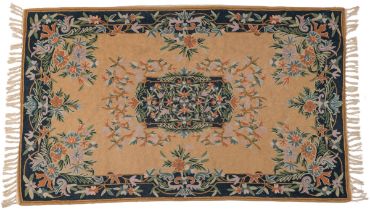 An Oriental needlework rug