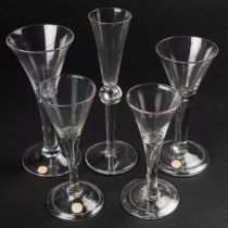 Five antique wine glasses